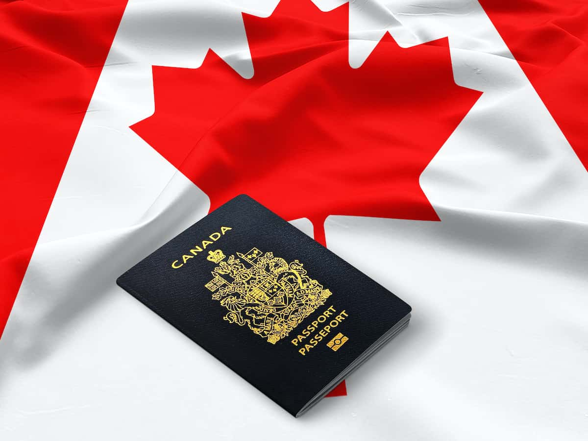 Canadian passport on flag